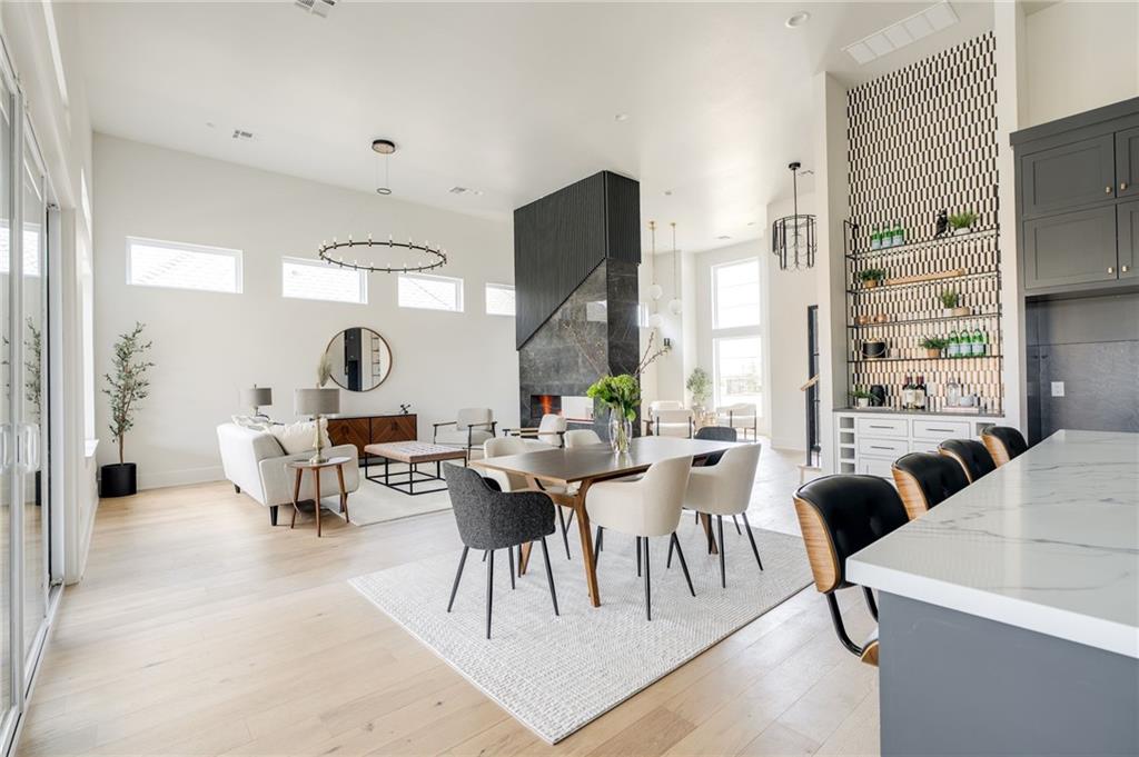 Cover image Staged open-concept living space by All About Staging, featuring modern furnishings and a serene ambiance.